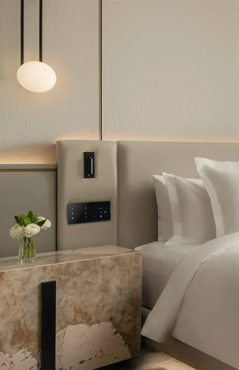 Luxio Controls hotel room-management system in a hospitality guest room